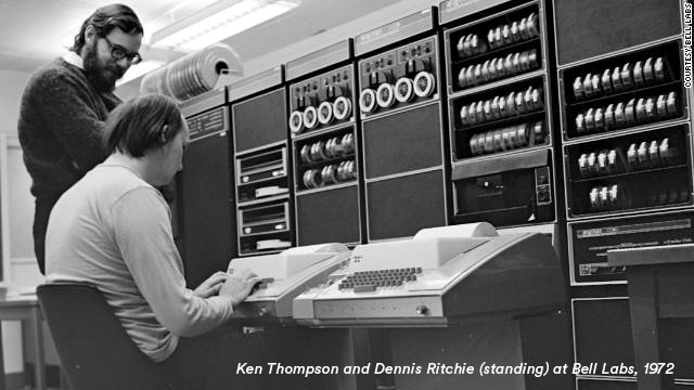 Ken Thompson and Dennis Ritchie (standing) at Bell Labs, 1972